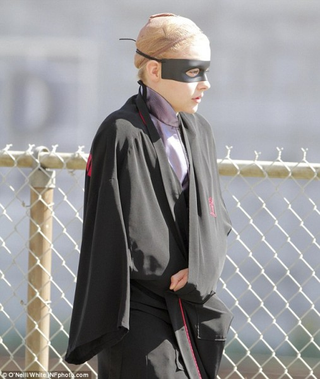 Illustration for article titled Hit Girl's growing up so fast in these new Kick-Ass 2 set pics